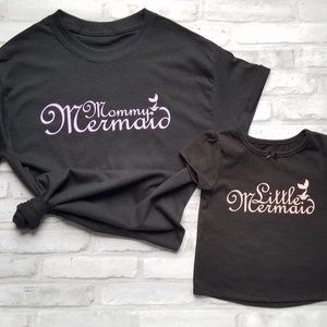 Matching mommy and me mermaid shirts.